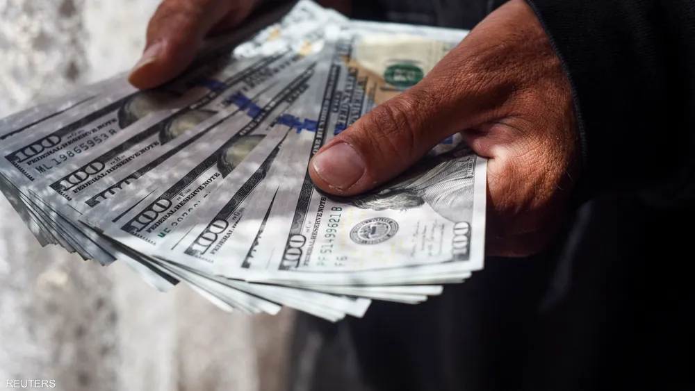 الدولار-يتحفظ